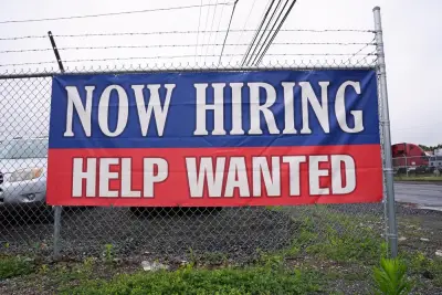 U.S. applications for jobless aid fell to 233,000 last week as layoffs remain low